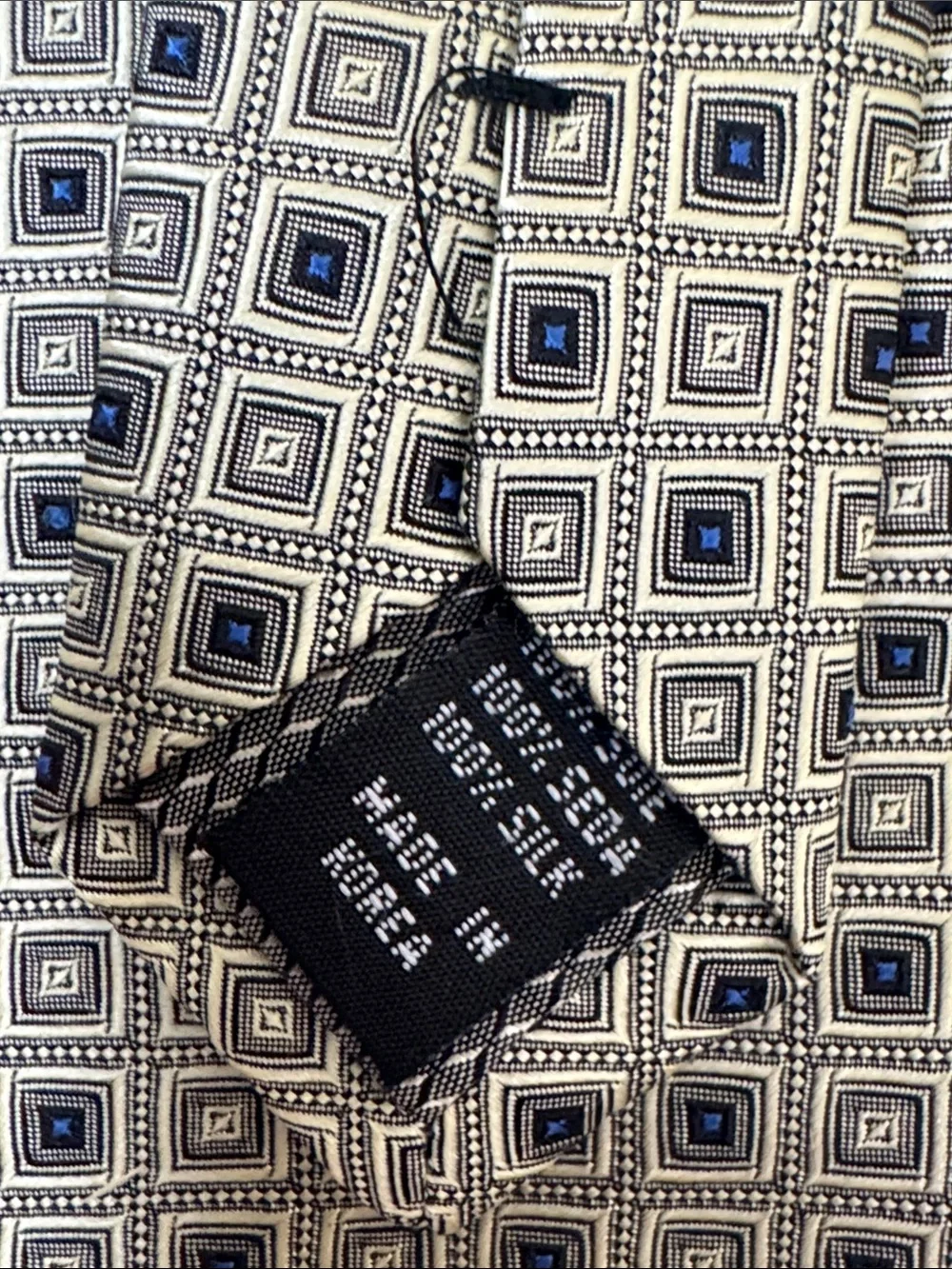 Chas Reed & Co Men’s Necktie Cream Jacquard Silk Tie with Blue Accents